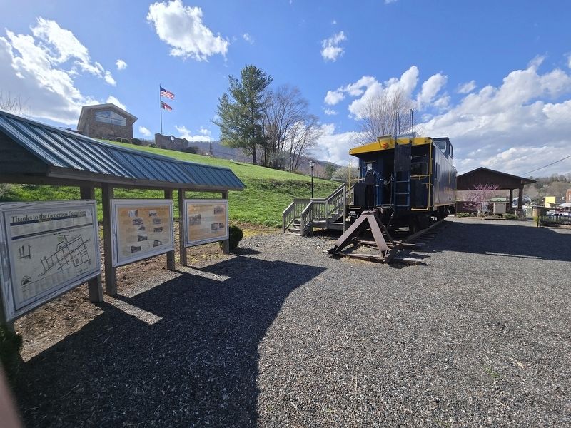 The Virginia Creeper in West Jefferson Marker next to the Norfolk & Western caboose. Click for full size. The Virginia Creeper in West Jefferson Marker next to the Norfolk & Western caboose image. Click for full size.