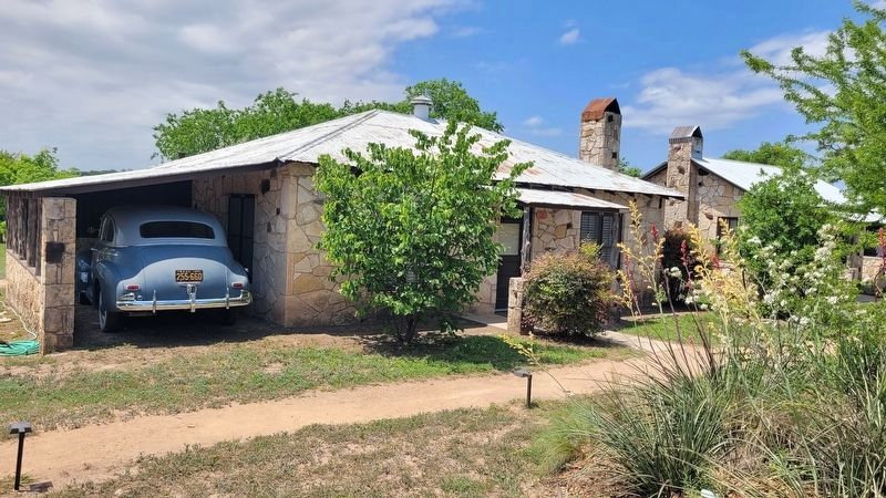 One of the cabins at the River Oaks Courts with a classic car in the carport image. Click for full size.