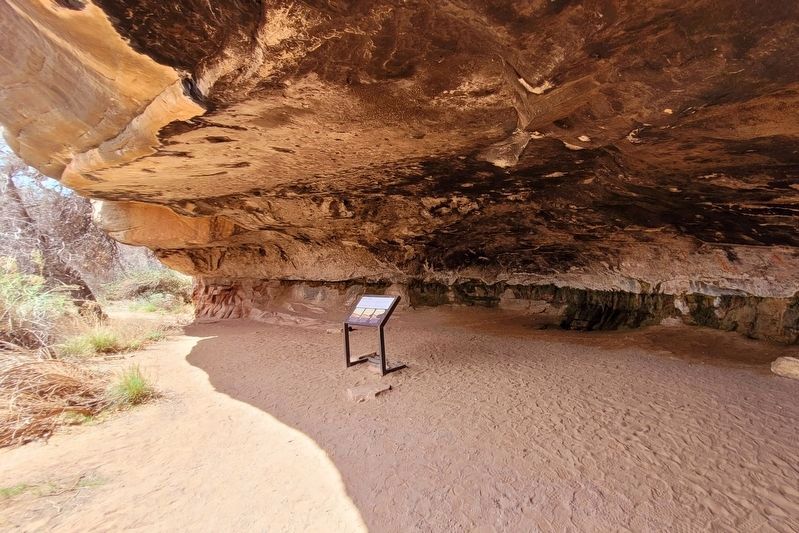 A wide view of the Water to Live By Marker in the alcove (cave). Click for full size. A wide view of the Water to Live By Marker in the alcove (cave) image. Click for full size.