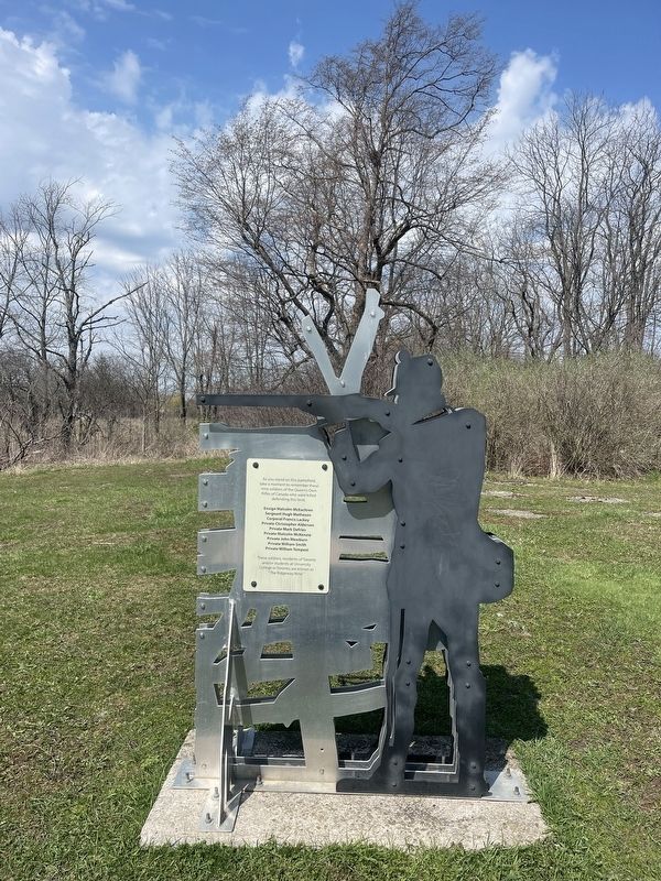 Memorial to soldiers Of the Queens Own Rifles, the historic ironwood tree is directly behind.. Click for full size. Memorial to soldiers Of the Queens Own Rifles, the historic ironwood tree is directly behind. image. Click for full size.