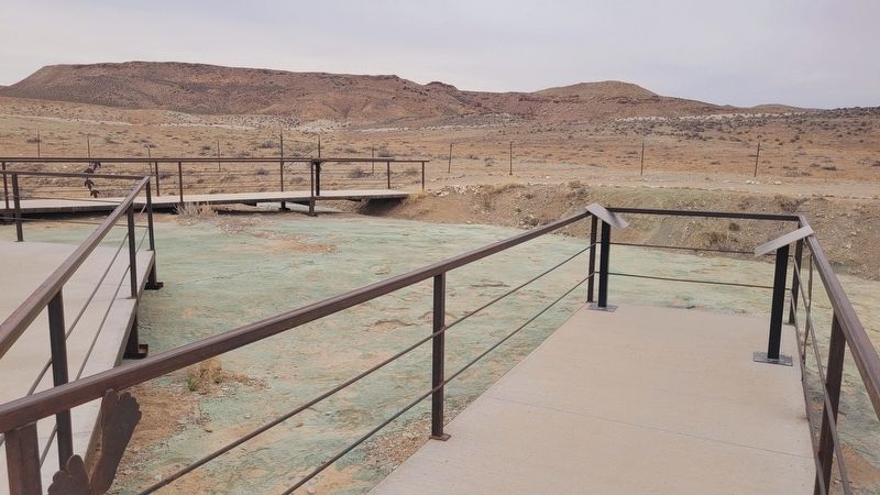 The view of the Ornithopod Tracks Marker along the trail (right side). Click for full size. The view of the Ornithopod Tracks Marker along the trail (right side) image. Click for full size.
