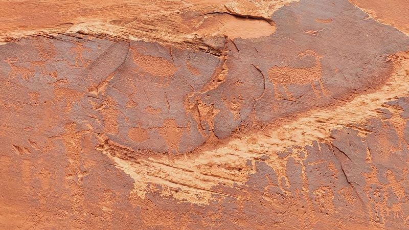 Rock Art along the road. Click for full size. Rock Art along the road image. Click for full size.