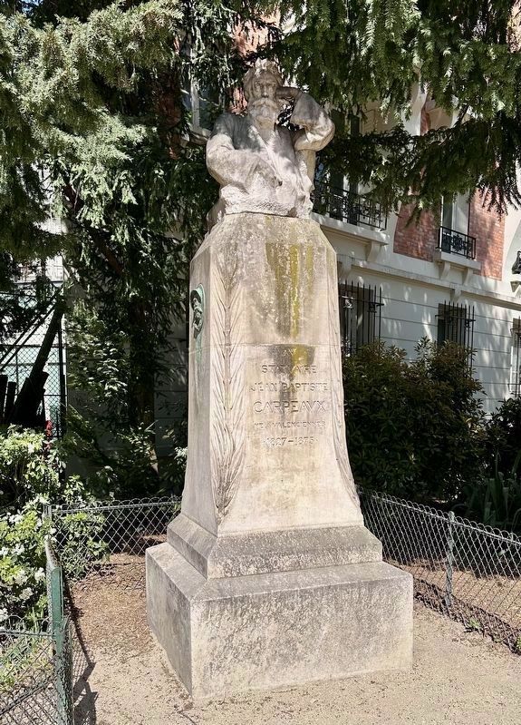 Statue of Jean-Baptiste Carpeaux, by Léon Fagel, on stele by Henri Bans. Click for full size. Statue of Jean-Baptiste Carpeaux, by Léon Fagel, on stele by Henri Bans image. Click for full size.