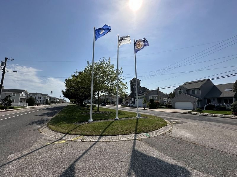 Avalon Home and Land Owner Assoc. Honors All Veterans Marker - flag pole display image. Click for full size.