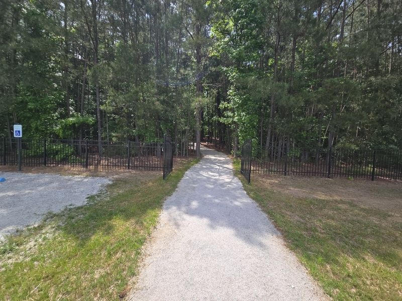 Rocky Mount Road Marker is along this path in the woods. Parking lot is to the left. Click for full size. Rocky Mount Road Marker is along this path in the woods. Parking lot is to the left image. Click for full size.