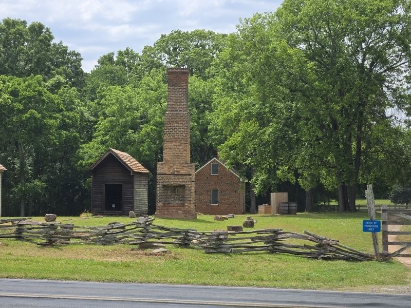 Chimney and foundation remains from the wooden store which burned in 2004.. Click for full size. Chimney and foundation remains from the wooden store which burned in 2004. image. Click for full size.
