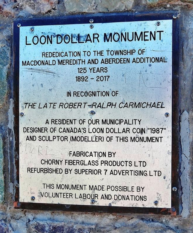 Loon Dollar Monument Plaque. Click for full size. Loon Dollar Monument Plaque image. Click for full size.