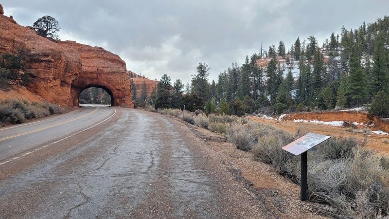 The view of the Red Canyon Tunnels Marker along the street (looking east) image. Click for full size.