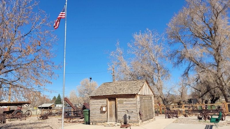The view of the First Iron County Log School House and Marker from the street. Click for full size. The view of the First Iron County Log School House and Marker from the street image. Click for full size.