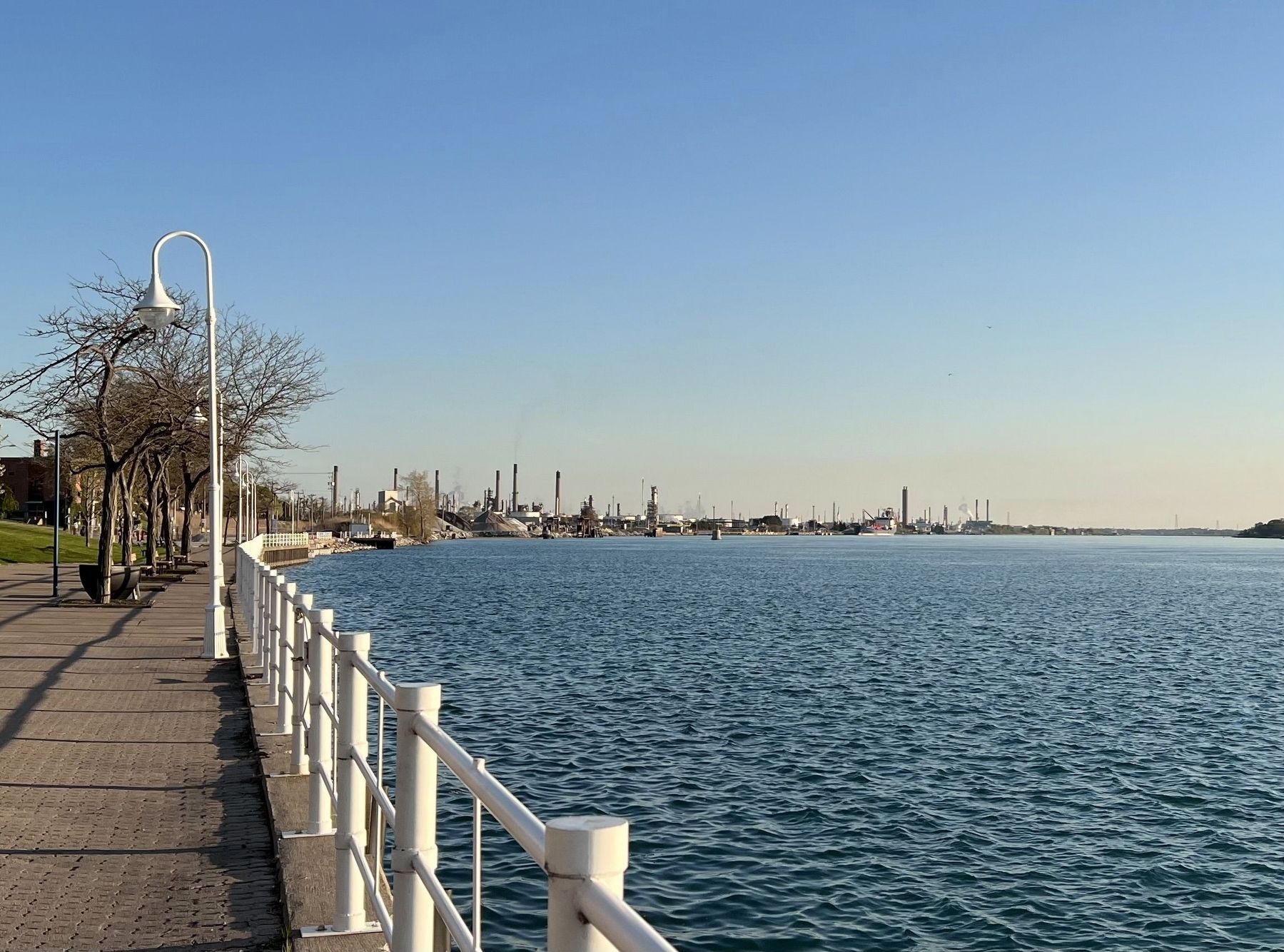 The St. Clair River at Sarnia, looking toward refineries (�Chemical Valley�), 2025 image. Click for full size.