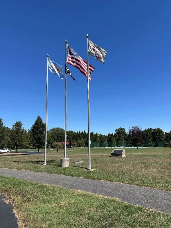 Veterans Memorial - wide view with flags. Click for full size. Veterans Memorial - wide view with flags image. Click for full size.