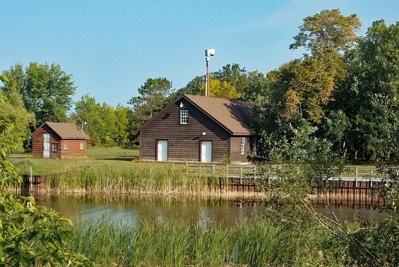 The historic Waskish Hatchery viewed across the Tamarac River from this marker. Click for full size. The historic Waskish Hatchery viewed across the Tamarac River from this marker image. Click for full size.