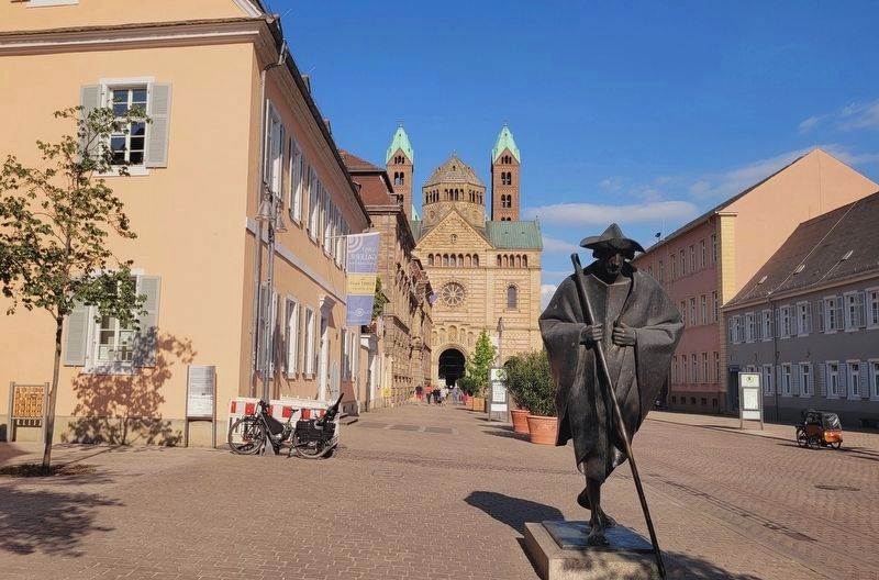The view of the bronze statue of a St. James pilgrim walking away from the cathedral. Click for full size. The view of the bronze statue of a St. James pilgrim walking away from the cathedral image. Click for full size.