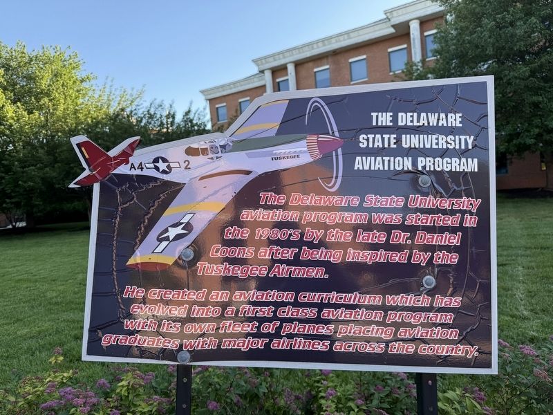 The Delaware State University Aviation Program signage [Right plaque] image. Click for full size.