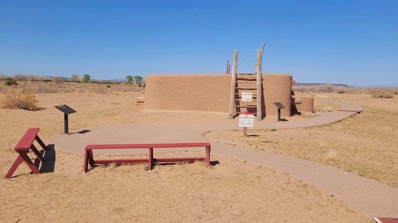 The view of the Reconstructed Pueblo and the Pedro de Castañeda Marker (Left Side). Click for full size. The view of the Reconstructed Pueblo and the Pedro de Castañeda Marker (Left Side) image. Click for full size.