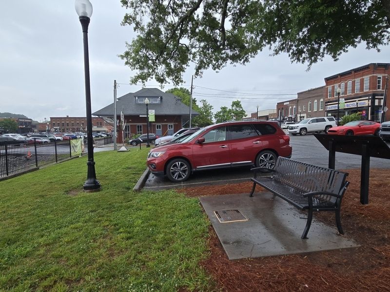A Bench by the Road Marker. The Cartersville train depot in the background is across W. Cherokee Ave image. Click for full size.