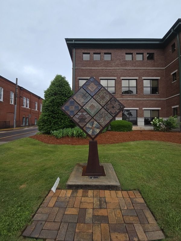 Pathways to Freedom: A Story in Every Stitch sculpture image. Click for full size.