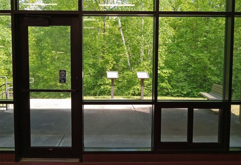 Rum River Rest Area Marker (right) on the back porch of the restroom building image. Click for full size.