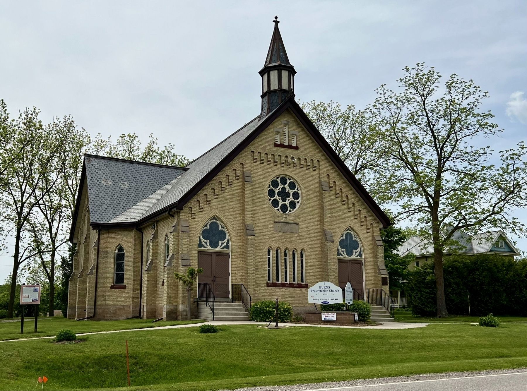 Burns Presbyterian Church (and Manse on the right) in 2025 image. Click for full size.