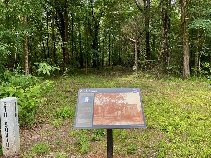 Castle Perine Marker with the Perine Well in far distance.. Click for full size. Castle Perine Marker with the Perine Well in far distance. image. Click for full size.