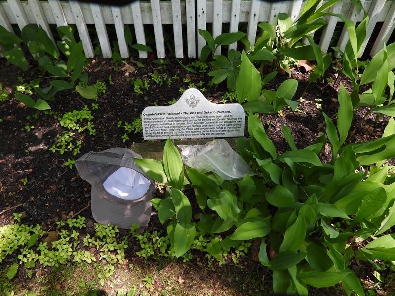 Ontario's First Railroad - The Erie and Ontario Railroad Marker (hat for scale) image. Click for full size.