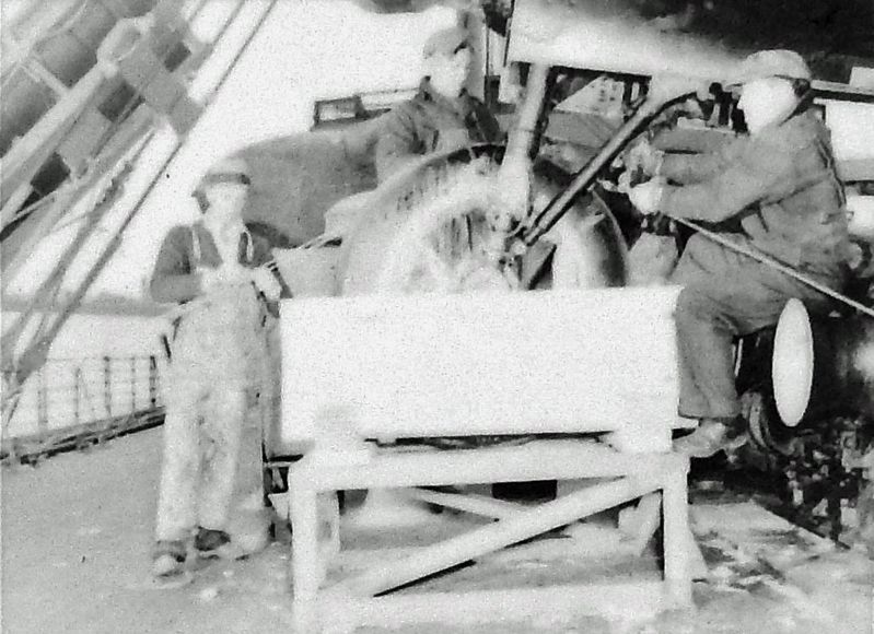 Marker detail: Workers securing a Handley Page Hampden aircraft to the deck image. Click for full size.