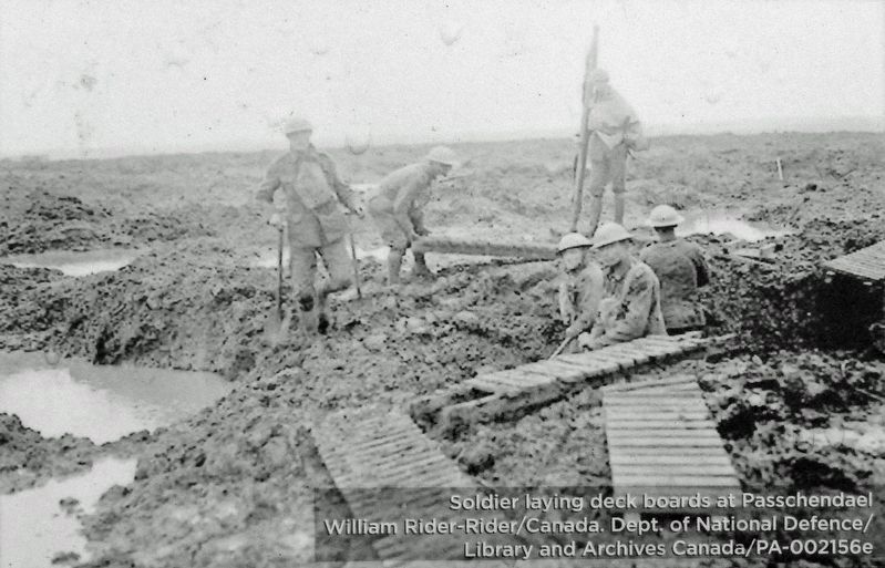 Marker detail: Soldier laying deck boards at Passchendaele image. Click for full size.