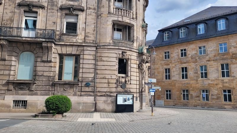 The view of the Iwalewa House and Marker along the street image. Click for full size.
