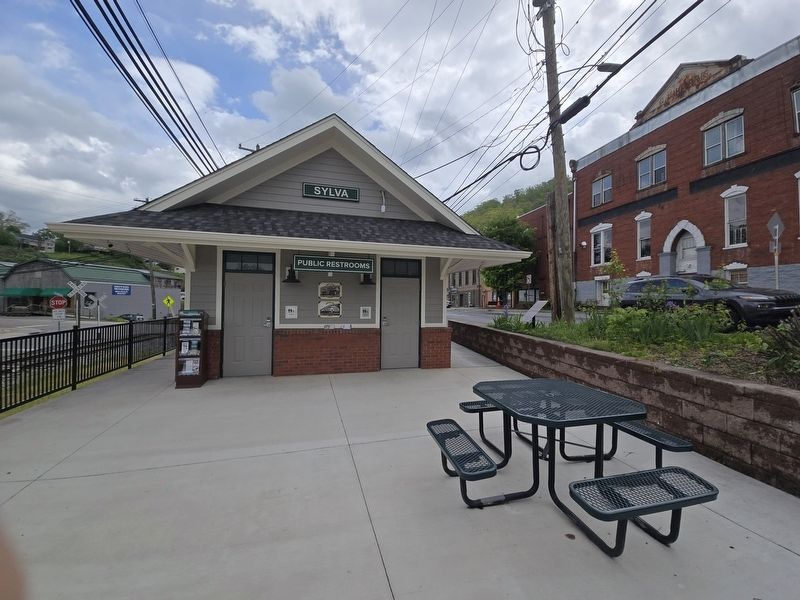 Original Sylva Train Depot Marker next to Sylva public restrooms image. Click for full size.
