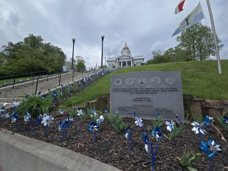 Jackson County Veterans Memorial next to the steps to the Jackson County Historic Courthouse. Click for full size. Jackson County Veterans Memorial next to the steps to the Jackson County Historic Courthouse image. Click for full size.