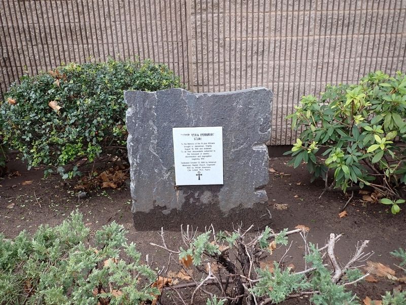 "Never Again Memorial" Stone image. Click for full size.