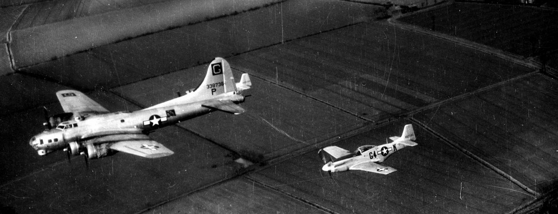 2 363 Fighter squadron P-51Ds escort a B-17 of 385th Bomb Group back to its UK base. image. Click for full size.