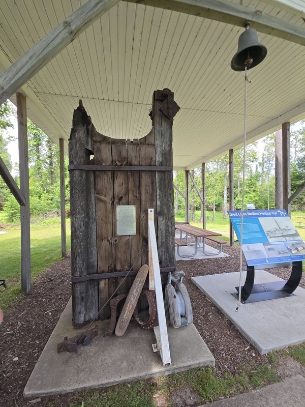 Marine City Marker next to the recovered rudder from the Marine City image. Click for full size.
