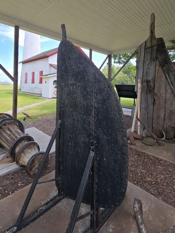Rudder from the Tugboat Loretta next to the Sturgeon Point Lighthouse. Click for full size. Rudder from the Tugboat Loretta next to the Sturgeon Point Lighthouse image. Click for full size.