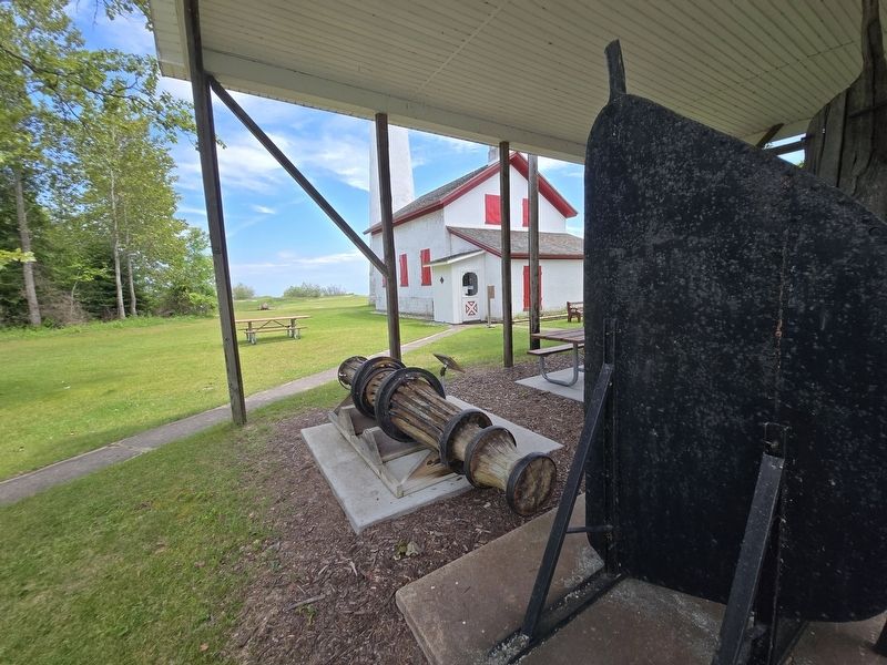 Anchor Windlass and Marker next to the Sturgeon Point Lighthouse. Click for full size. Anchor Windlass and Marker next to the Sturgeon Point Lighthouse image. Click for full size.