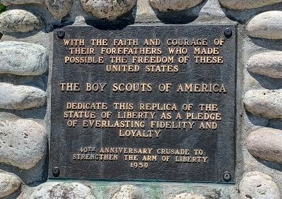 Saving Lady Liberty Marker plaque on front of the base. Click for full size. Saving Lady Liberty Marker plaque on front of the base image. Click for full size.