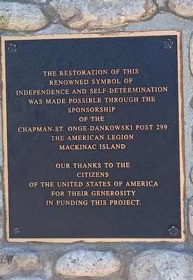 Lady Liberty on the Island Marker plaque on the back of the base. Click for full size. Lady Liberty on the Island Marker plaque on the back of the base image. Click for full size.