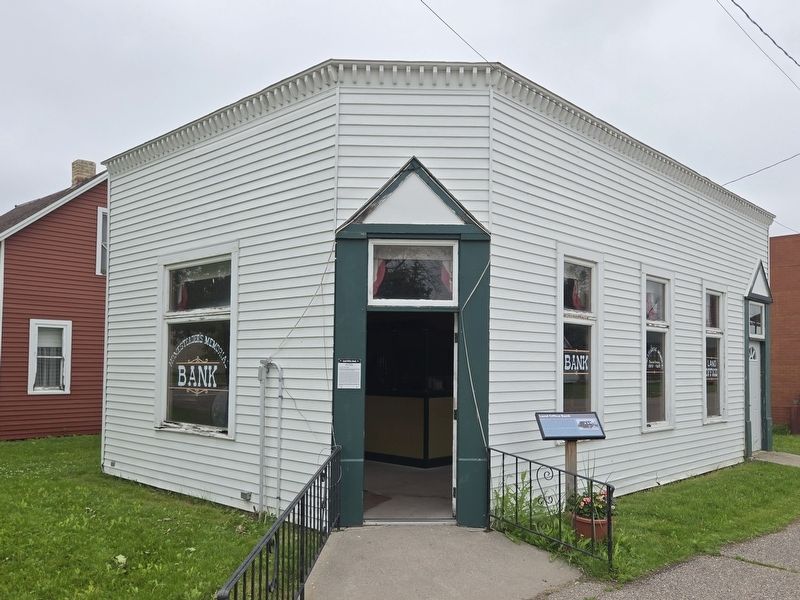 Replica Land Office Bank. Marker is right of the entryway image. Click for full size.