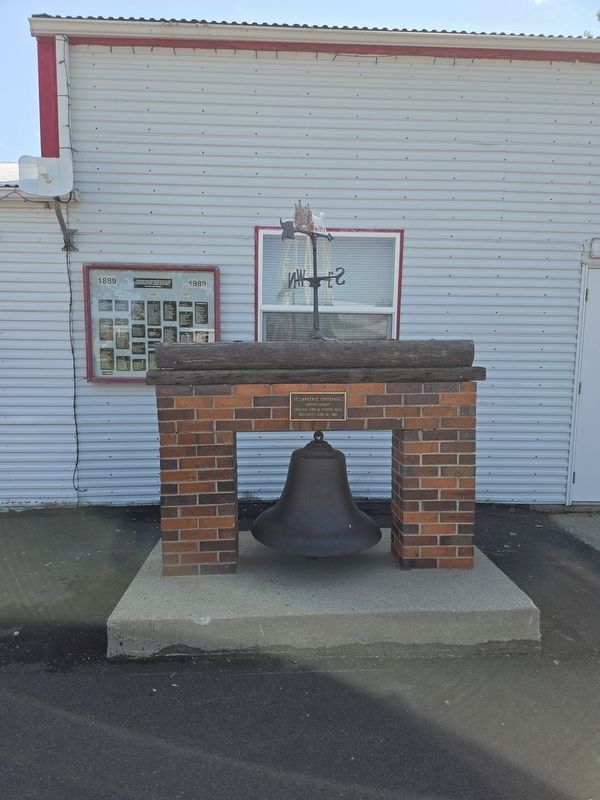 St. Lawrence Centennial marker and bell in front of the Town Volunteer Fire Department. Click for full size. St. Lawrence Centennial marker and bell in front of the Town Volunteer Fire Department image. Click for full size.