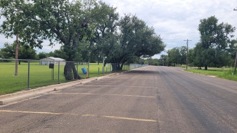 The view of the marker along the street. Click for full size. The view of the marker along the street image. Click for full size.