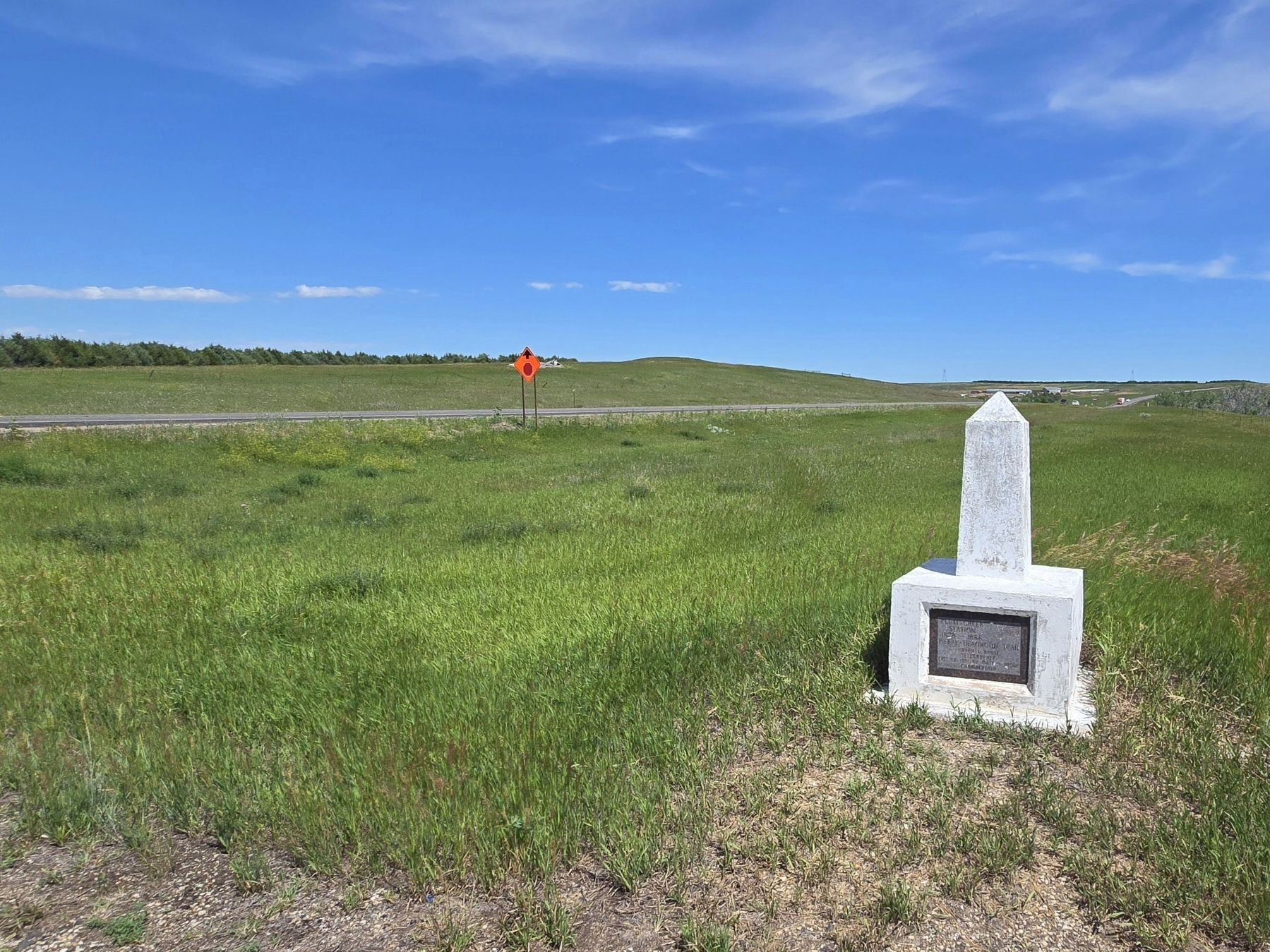 Plum Creek Station Marker looking north on US Hwy 14. Click for full size. Plum Creek Station Marker looking north on US Hwy 14 image. Click for full size.