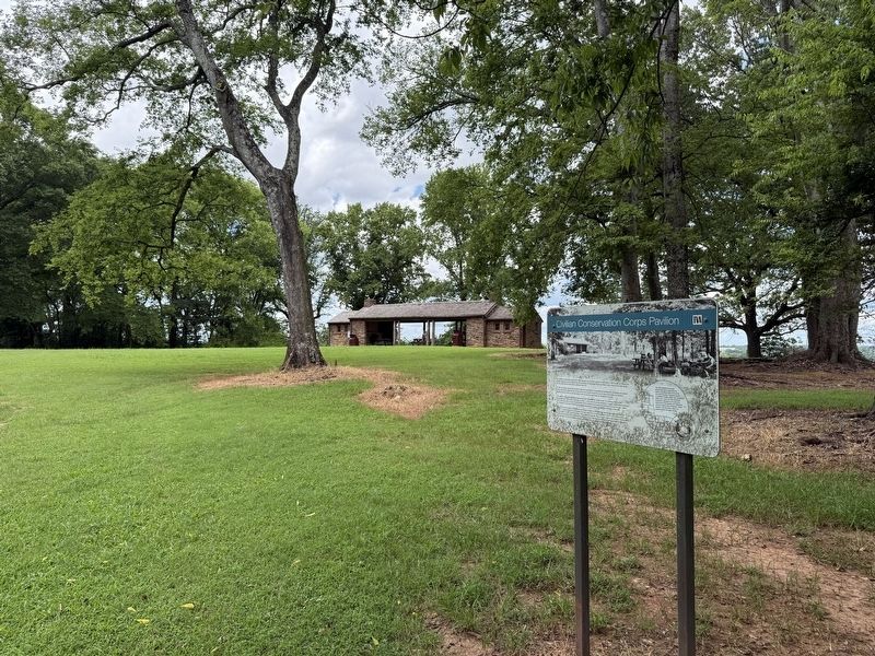Civilian Conservation Corps Pavillion Marker with pavillion in background image. Click for full size.