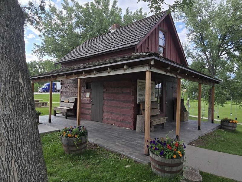 Buckskin Johnny Cabin. Marker is on the right over the bench. Click for full size. Buckskin Johnny Cabin. Marker is on the right over the bench image. Click for full size.