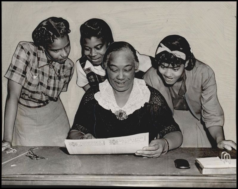 Zelia N. Breaux and unidentified students image. Click for full size.