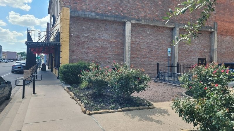 The view of the Texas Divided Marker along the street (marker at far right). Click for full size. The view of the Texas Divided Marker along the street (marker at far right) image. Click for full size.