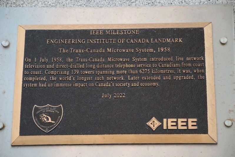 IEEE Milestone Marker - English panel image. Click for full size.