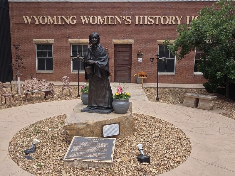_The Franchise" Statue and Marker in front of the Wyoming Women's History House. Click for full size. _The Franchise" Statue and Marker in front of the Wyoming Women's History House image. Click for full size.