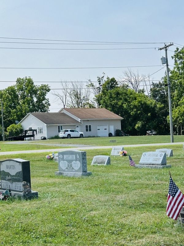 House Across From The Cemetery Entrance image. Click for full size.