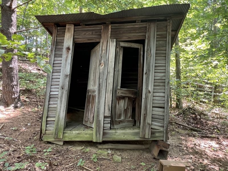 Church outhouse image. Click for full size.