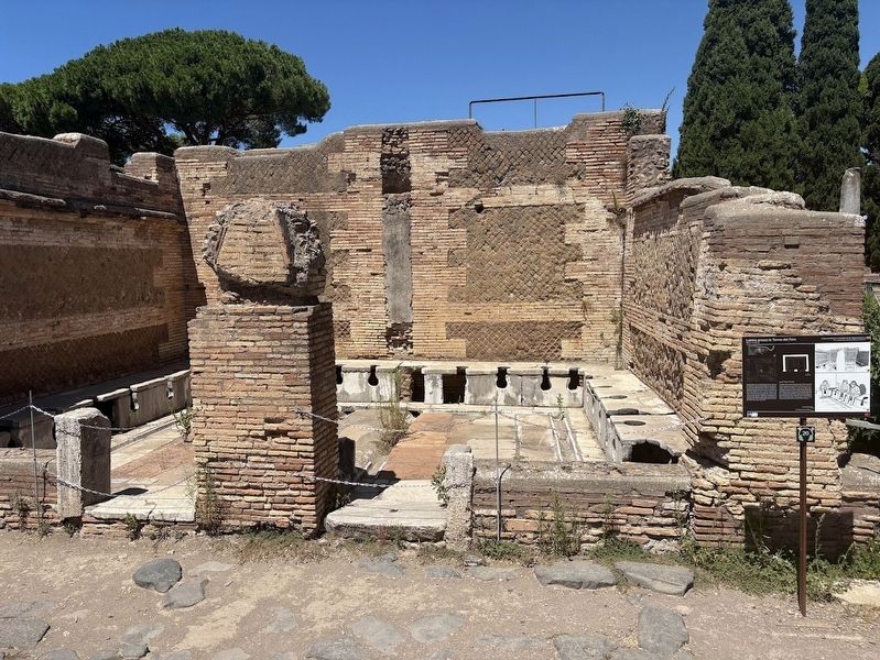 Ancient toilets at Ostia image. Click for full size.